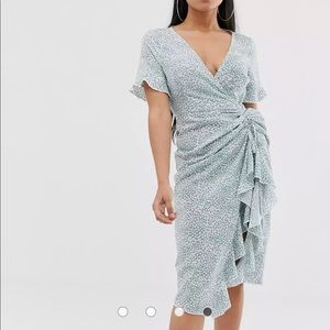 NWOT midi dress with ruched thigh split in floral print